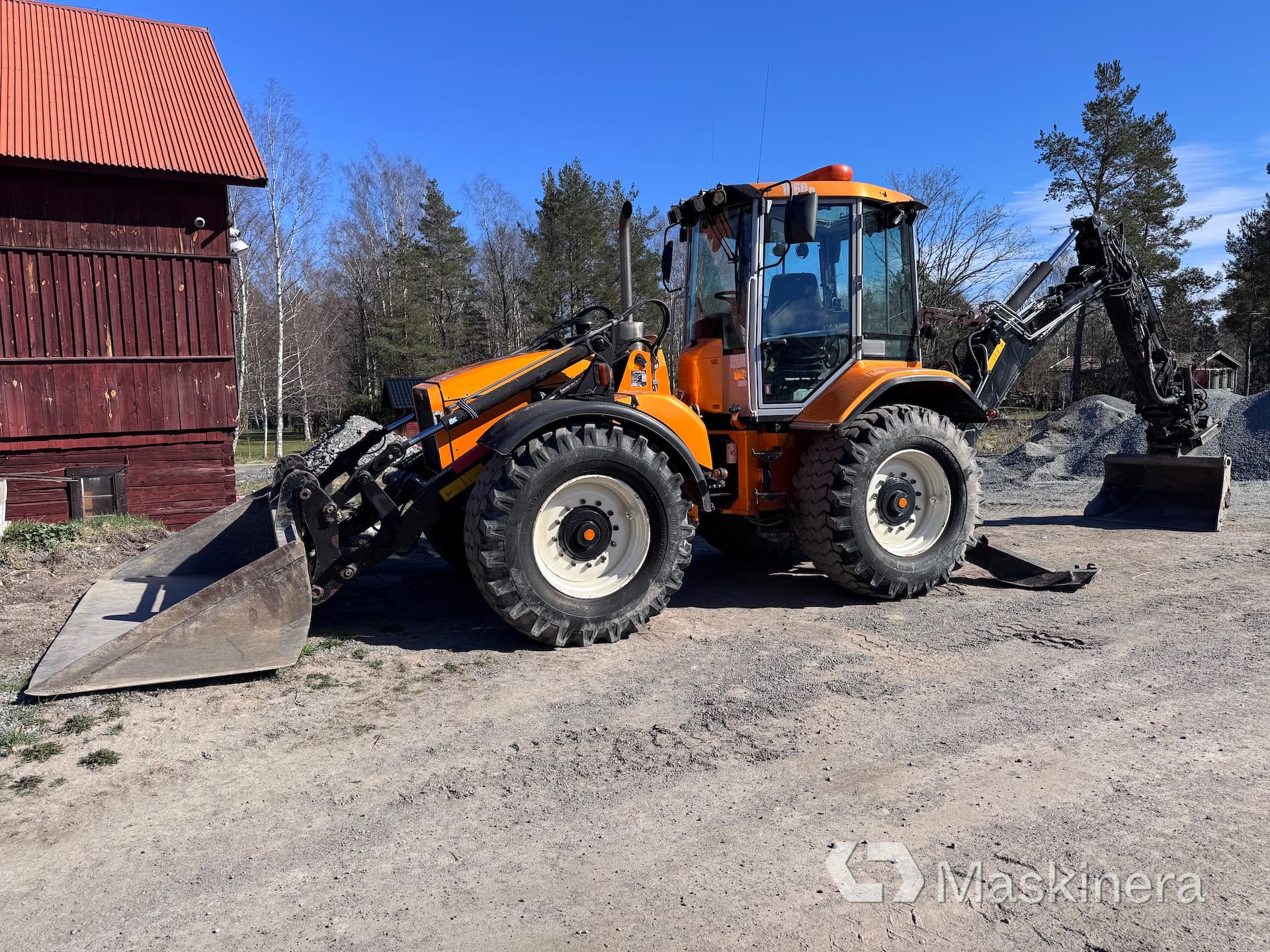 Traktorgrävare Huddig 1060B