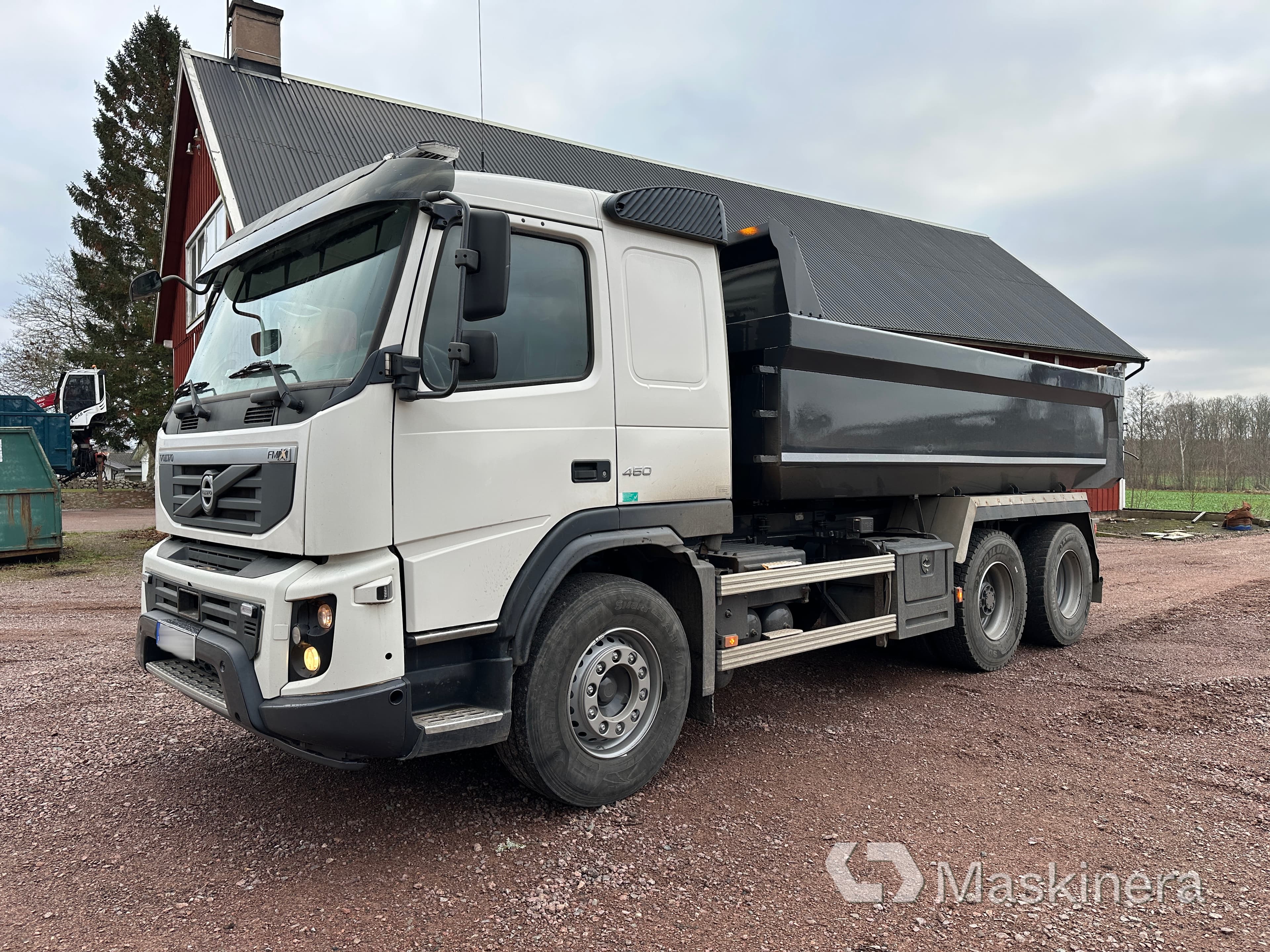 Schaktbil Volvo FM 450 med 3-axlad jigg