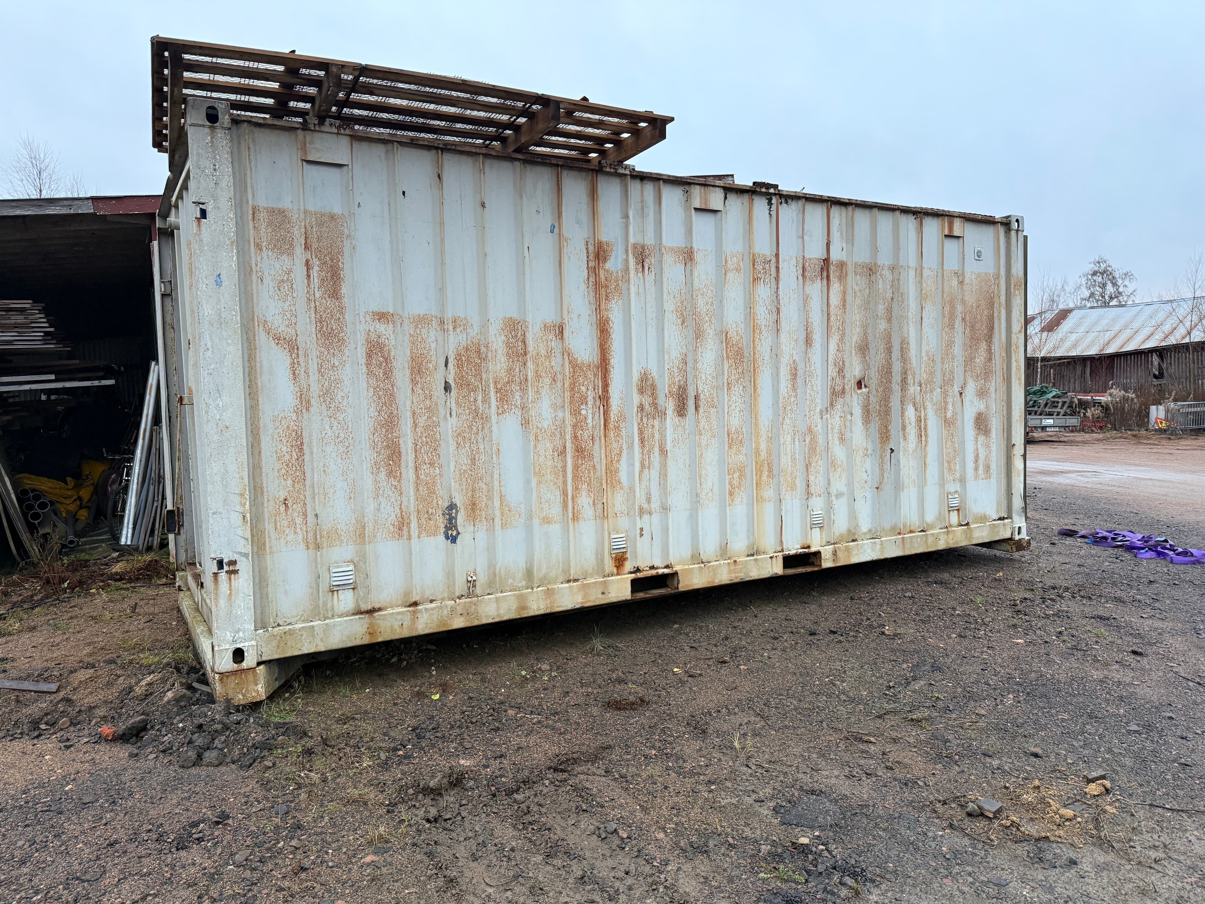 Sjöcontainer med lastväxlarfäste