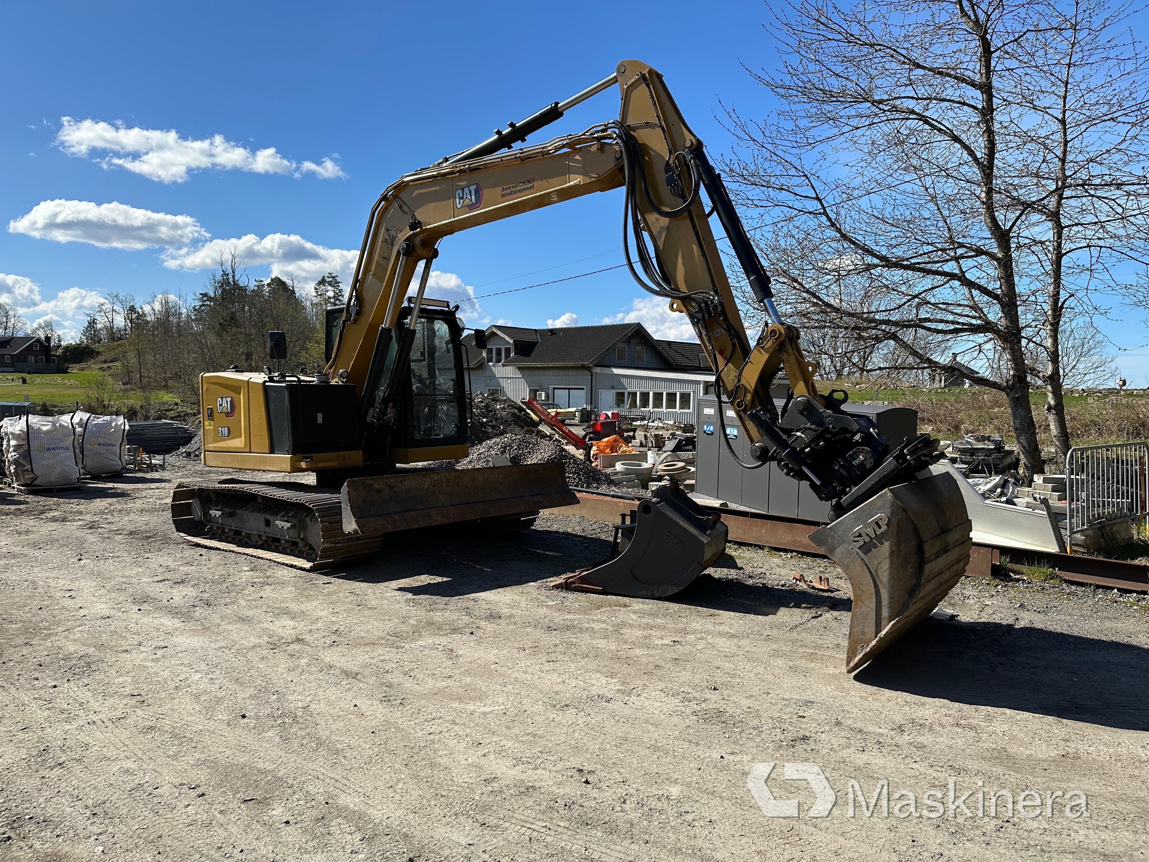 Grävmaskin CAT 310