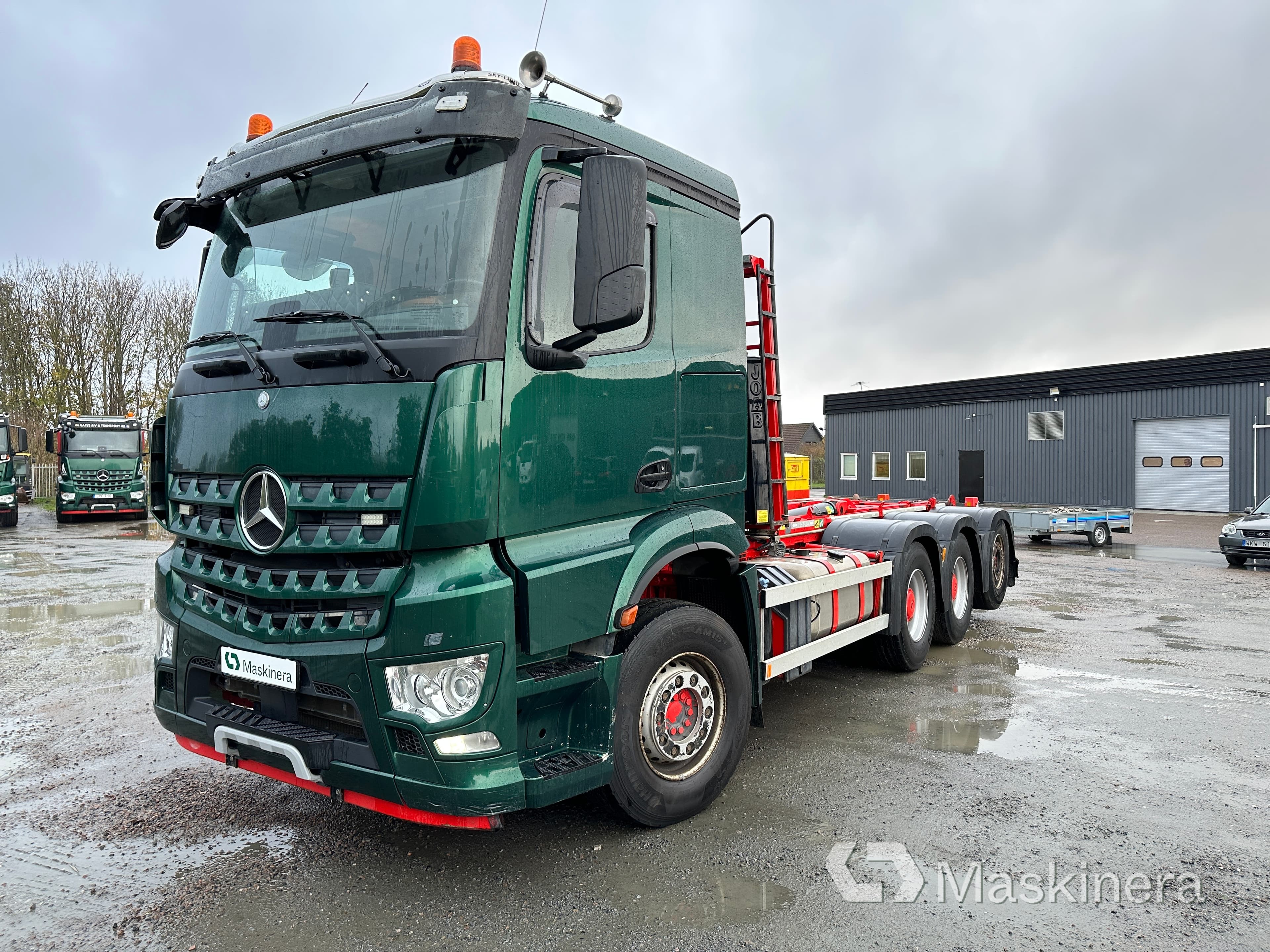 Lastväxlare Mercedes-Benz Arocs 8X4 Tridem