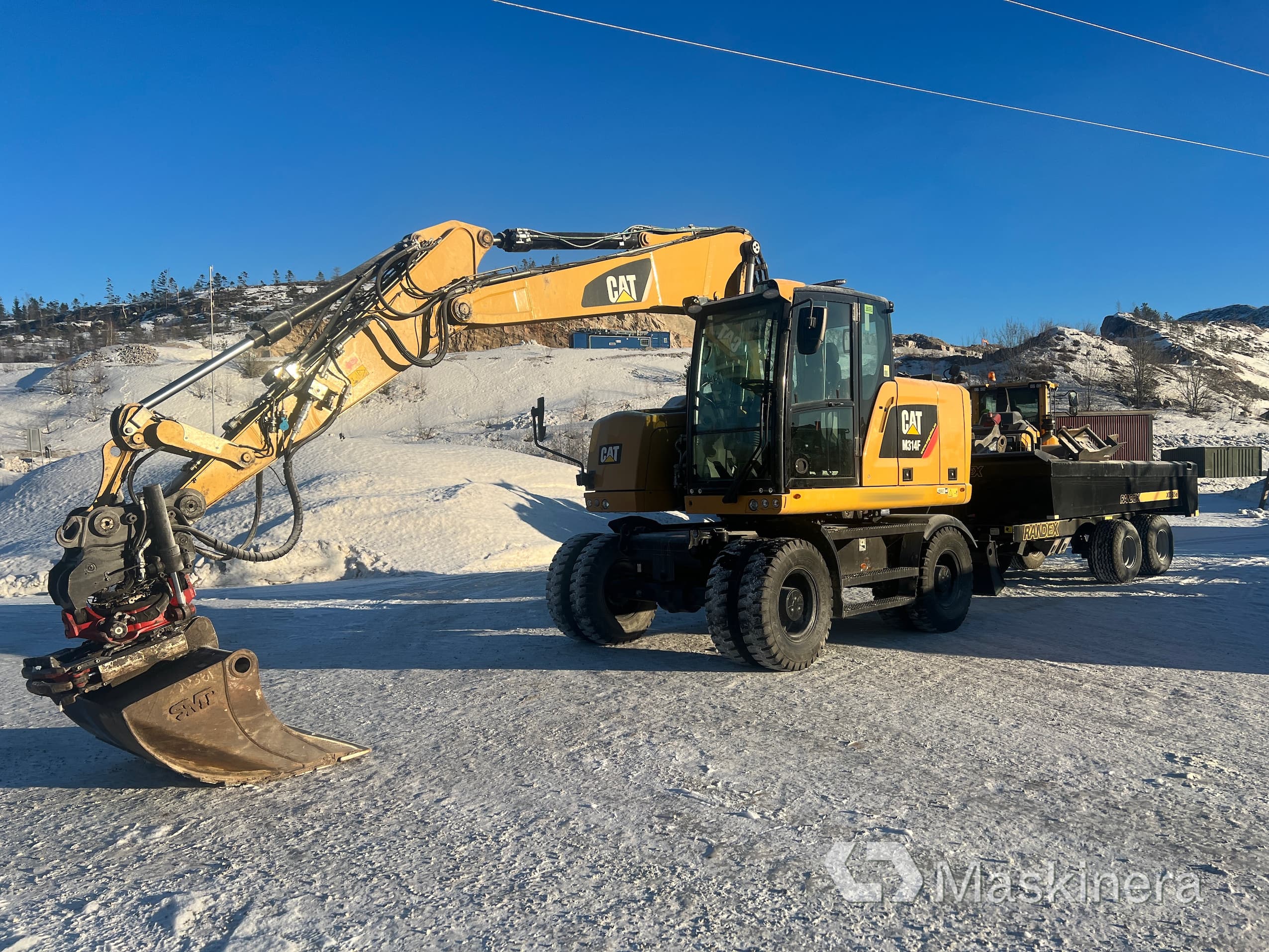 Hjulgrävare CAT M314F med vagn & redskap