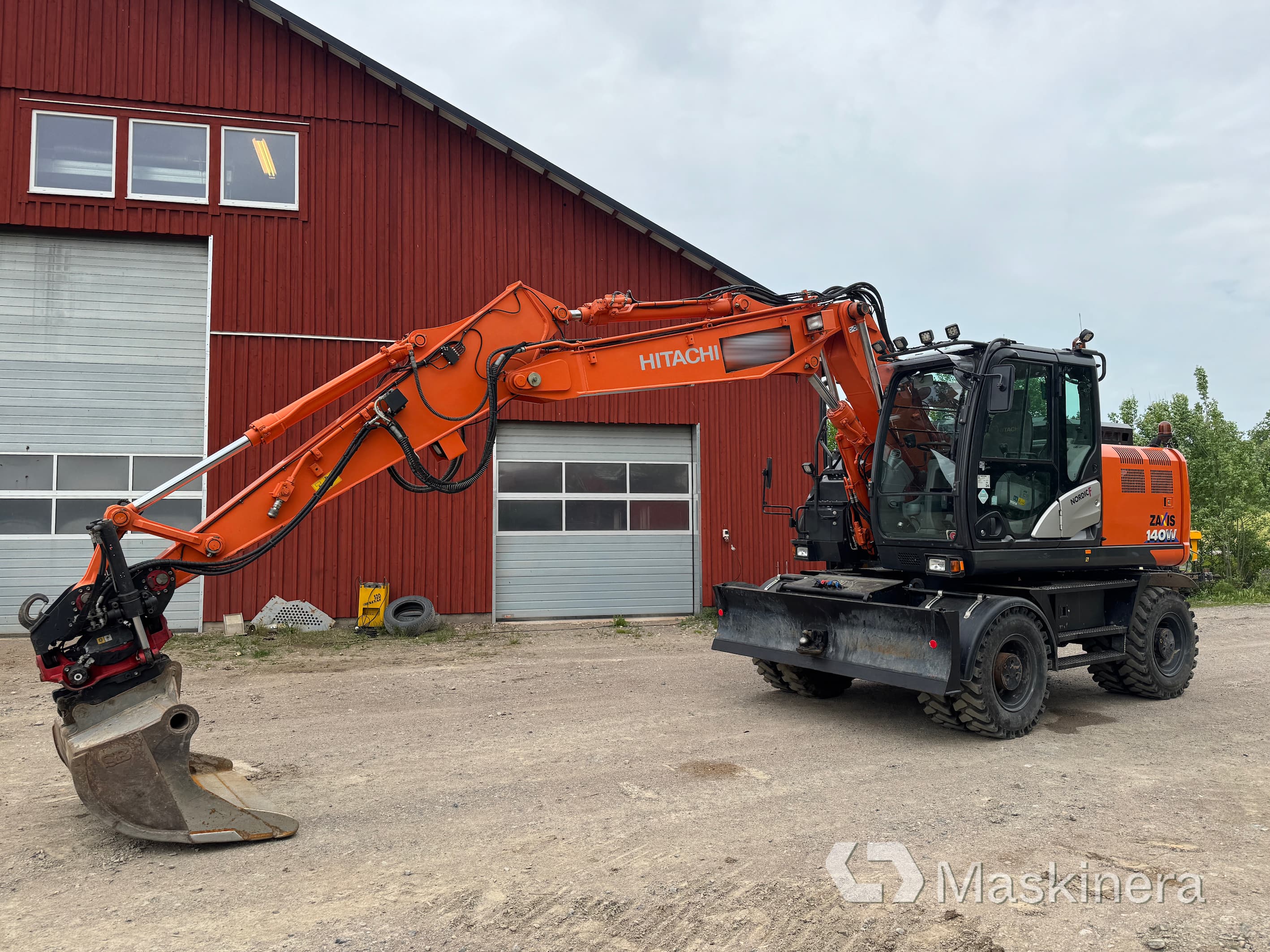 Hjulgrävare Hitachi Zaxis 140W med redskap