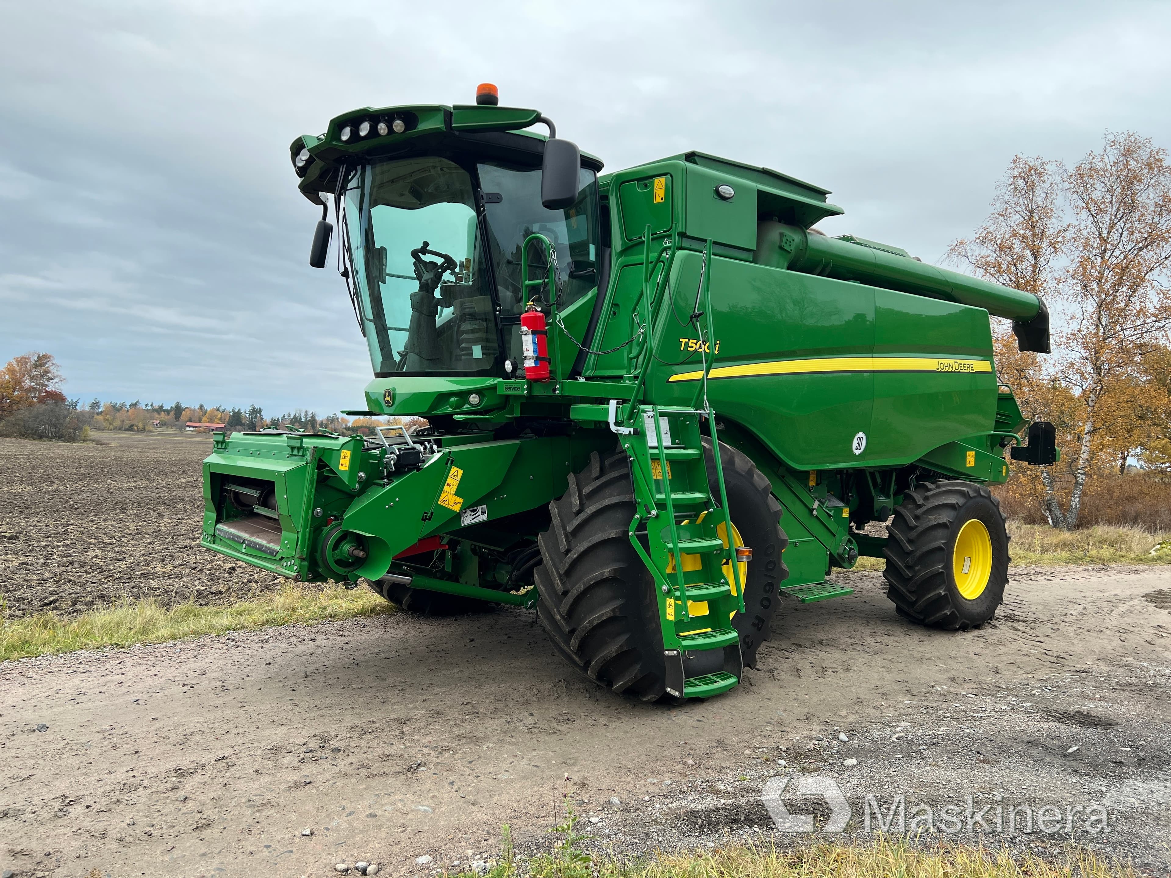 Skördetröska John Deere T560i